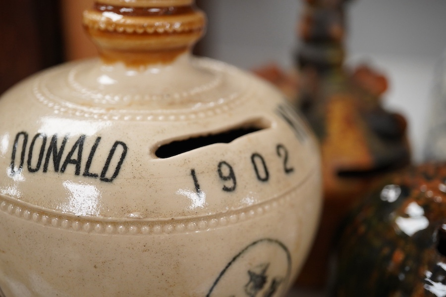 A group of ten various 19th century stoneware money boxes, tallest 19cm. Condition - varies